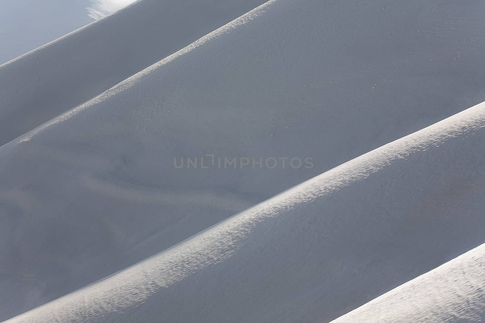 Dunes of snow in the hills of Castelluccio of Norcia, Italy