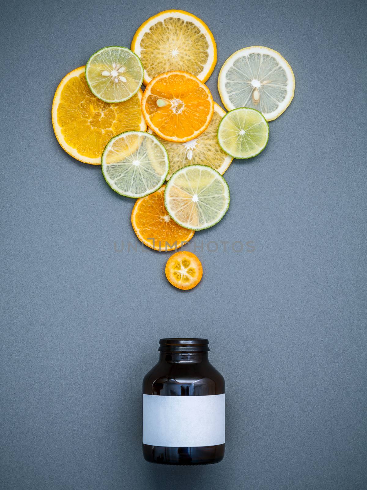 Healthy foods and medicine concept. Bottle of vitamin C and vari by kerdkanno