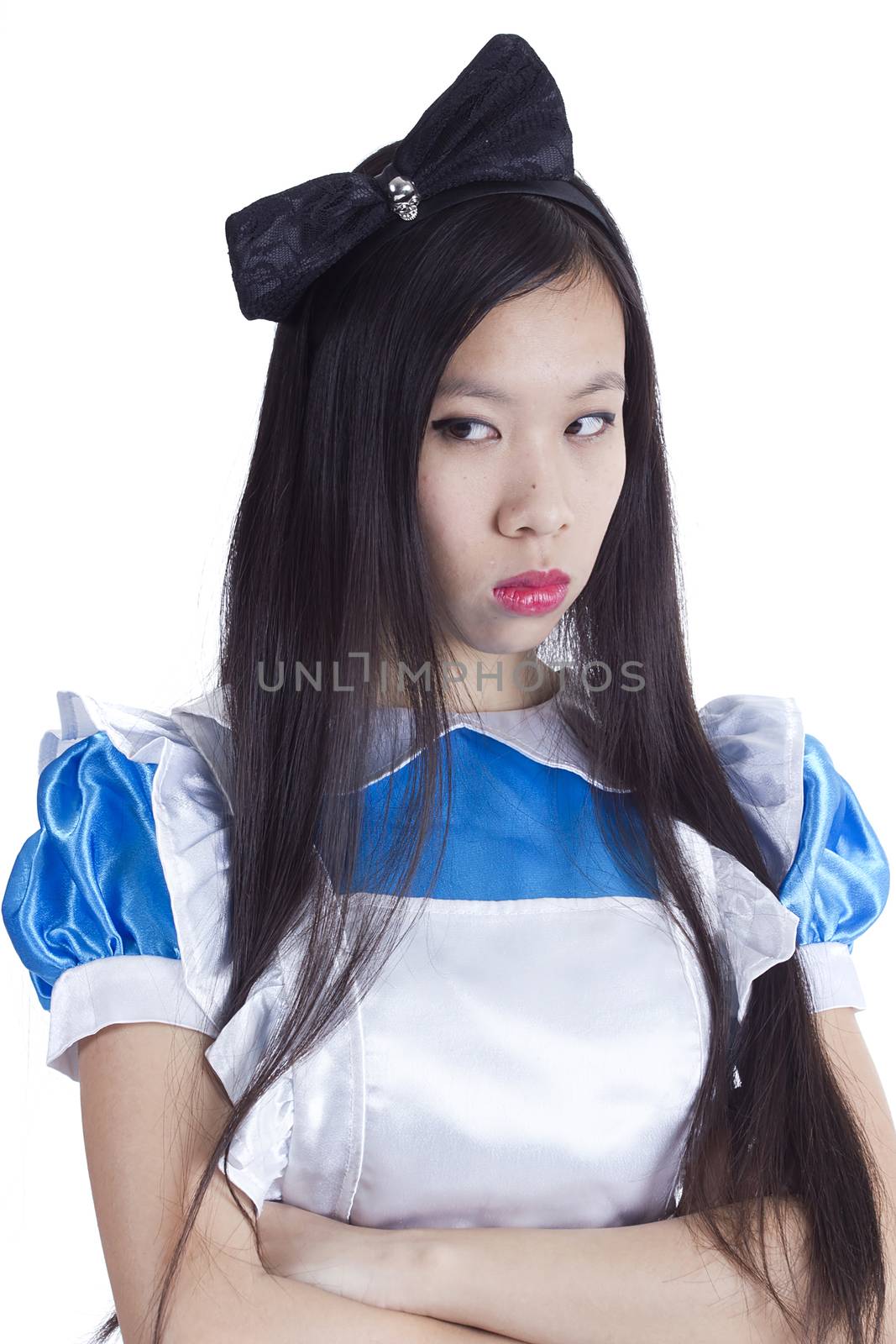 Young girl in the image of Alice on a white background