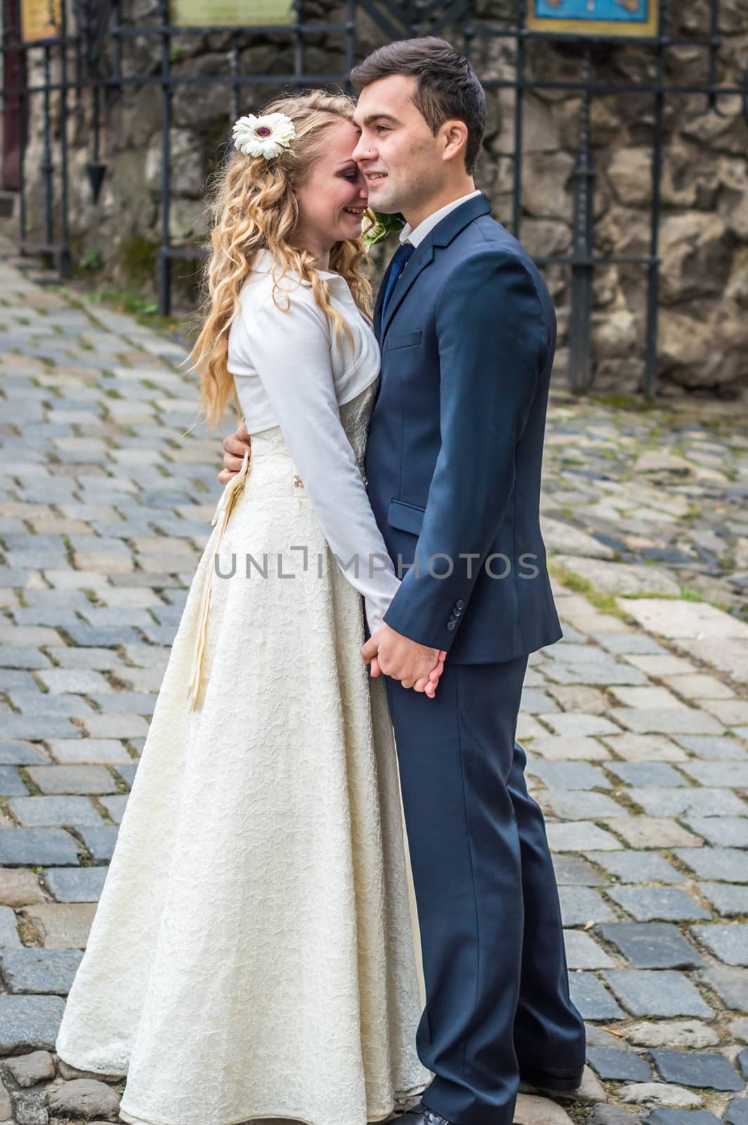 newlyweds strolling around the city. Just married