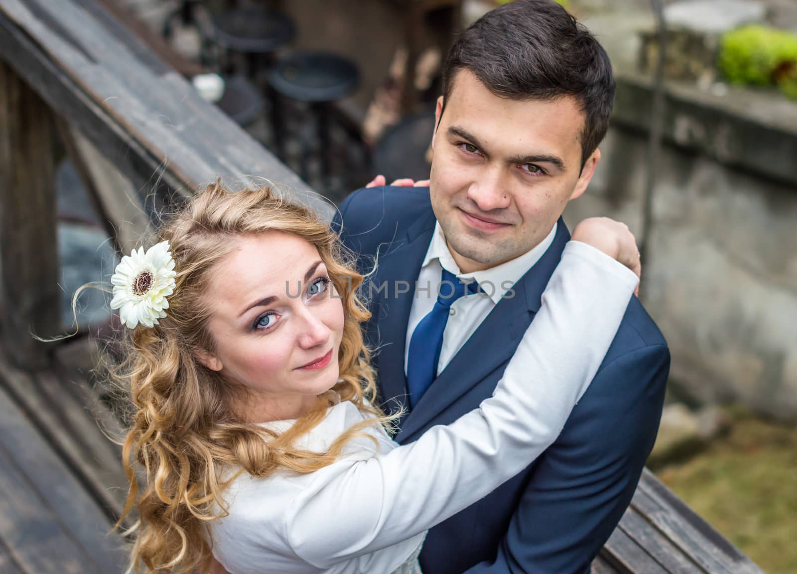 newlyweds strolling around the city by okskukuruza