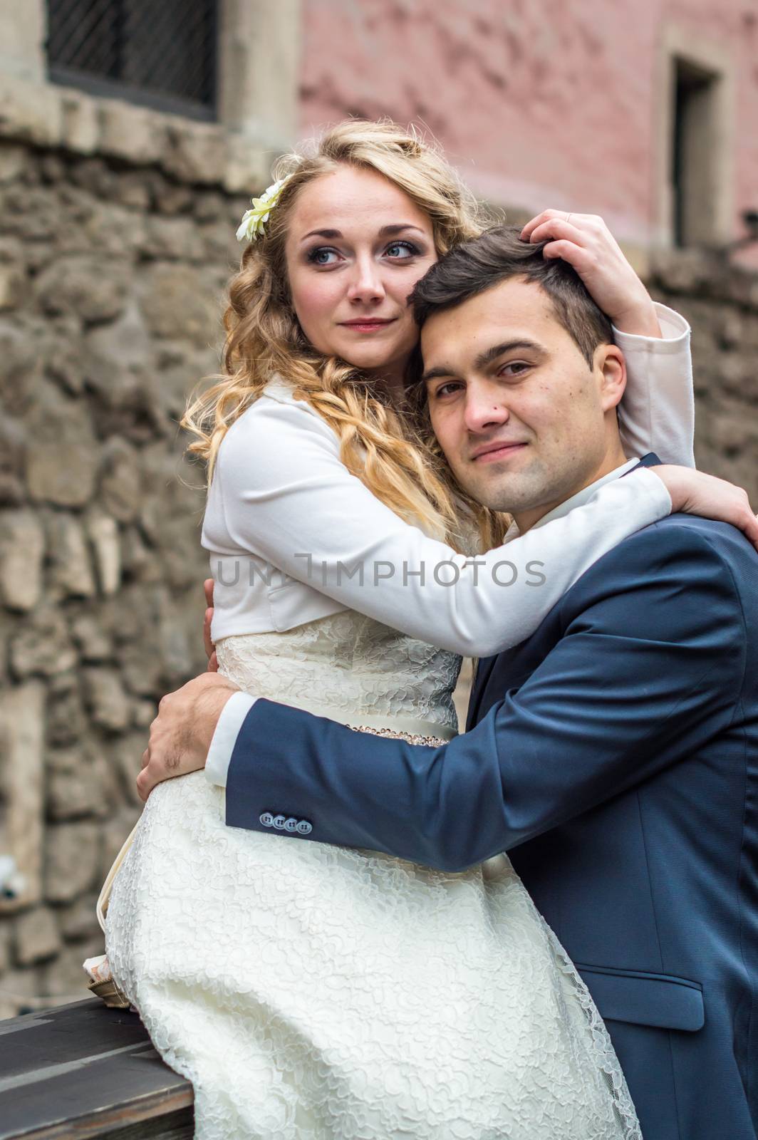 newlyweds strolling around the city. Just married