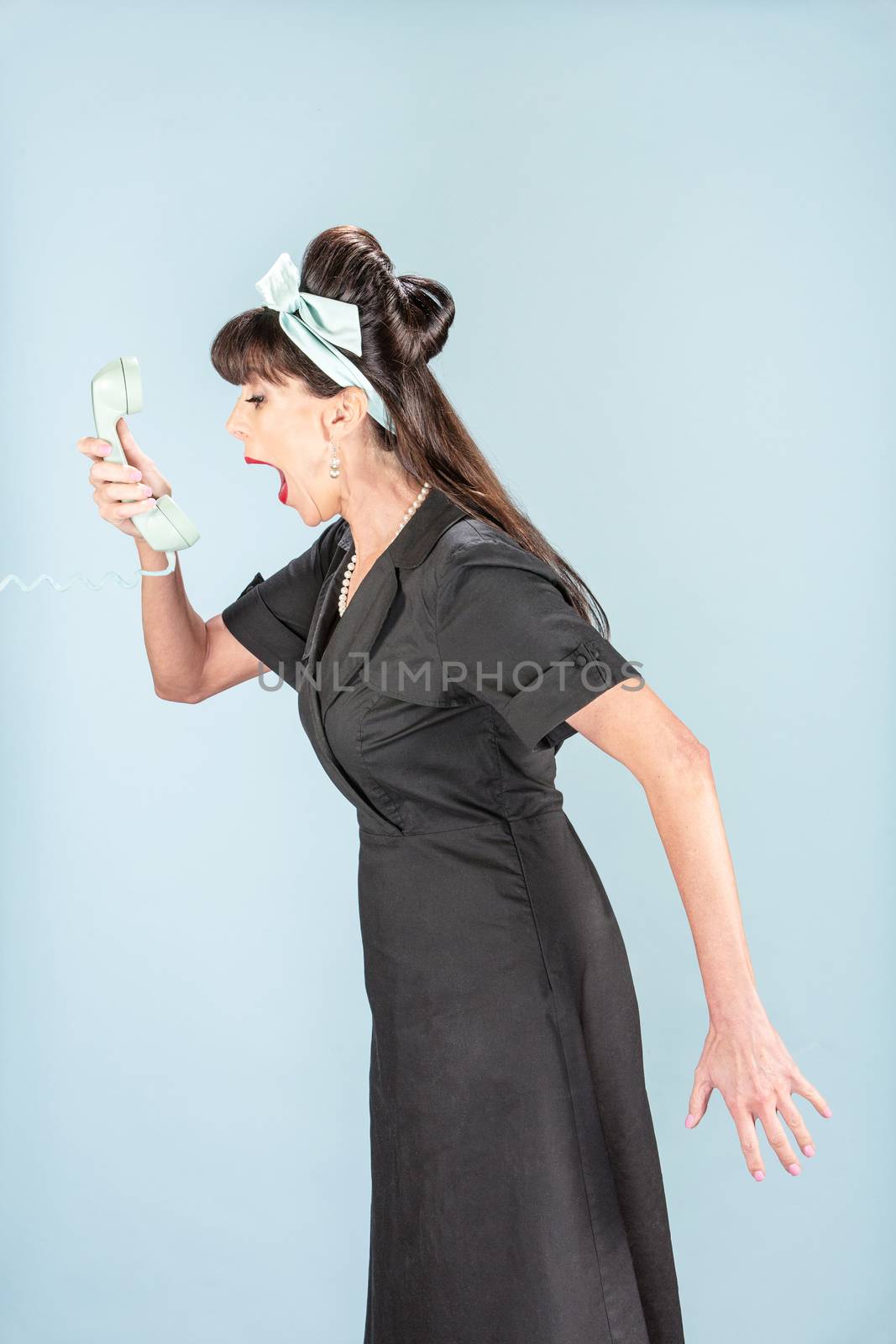 Yelling Retro Woman in Black Dress with Phone Receiver by Creatista