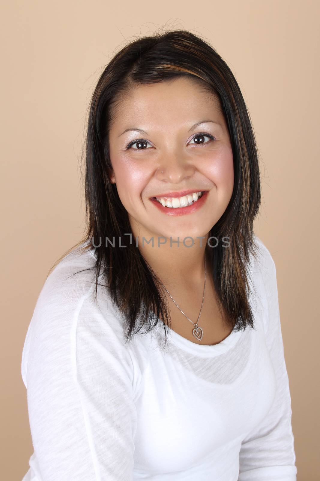 Beautiful Native American girl in studio portrait