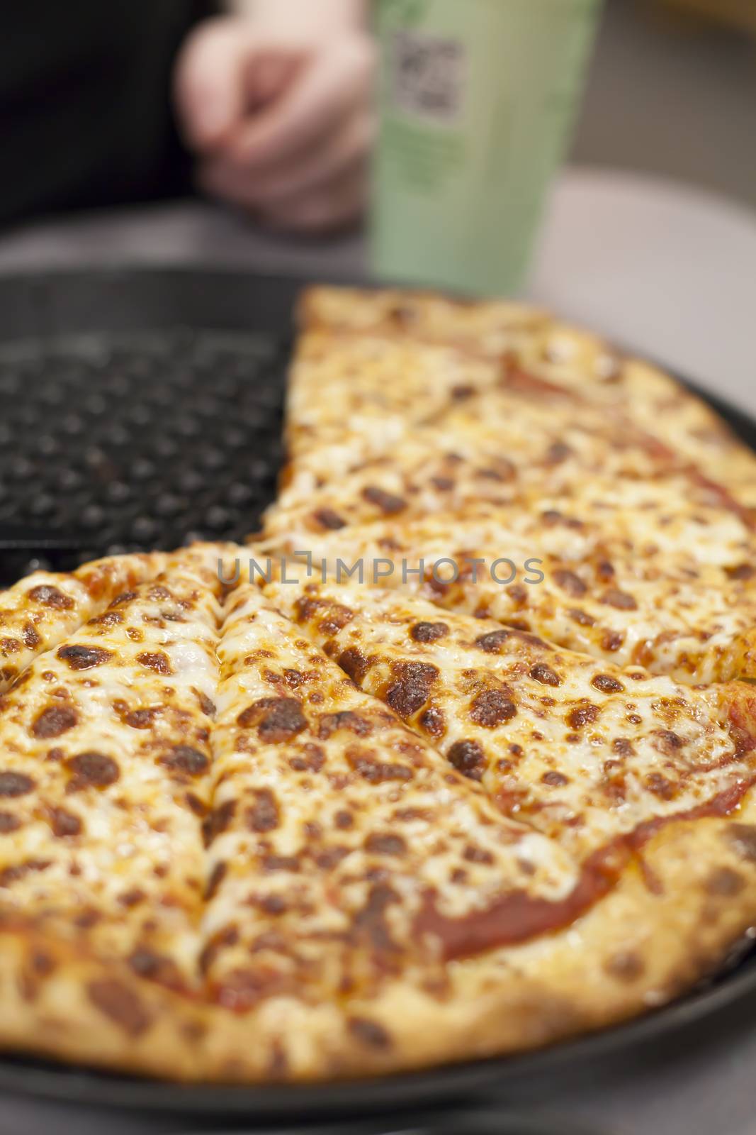 Sliced cheese pizza with thick crust