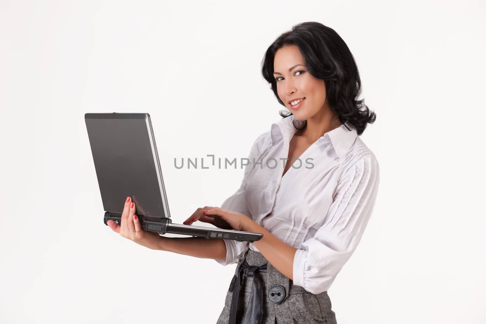 Young woman holding notebook in her hands