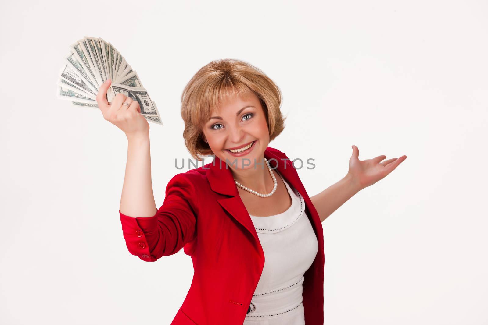 Young woman with a bunch of dollar banknotes