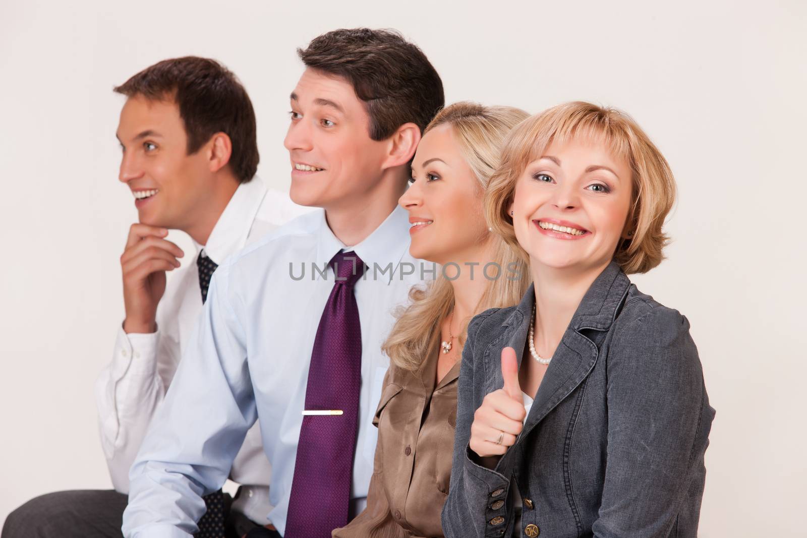 Group of young men and women on isolated background