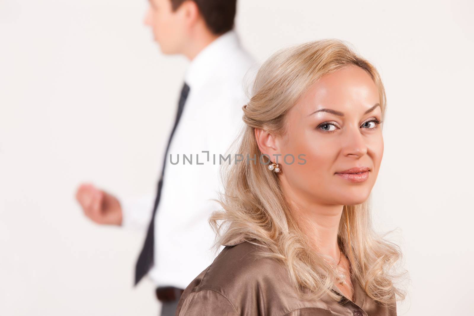 Group of young men and women on isolated background