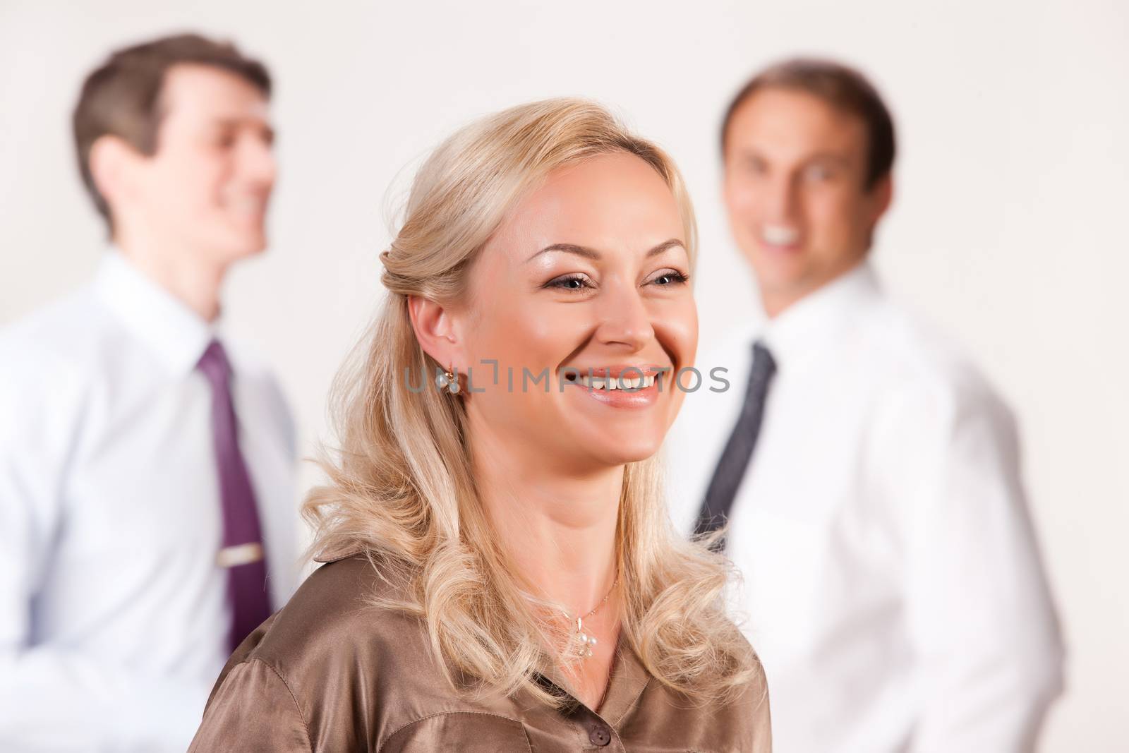 Group of young men and women on isolated background