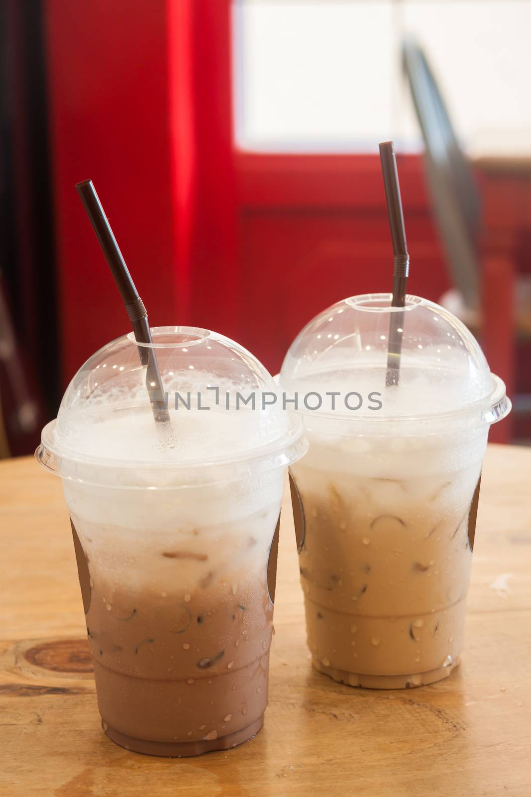 Iced coffee in coffee shop by punsayaporn