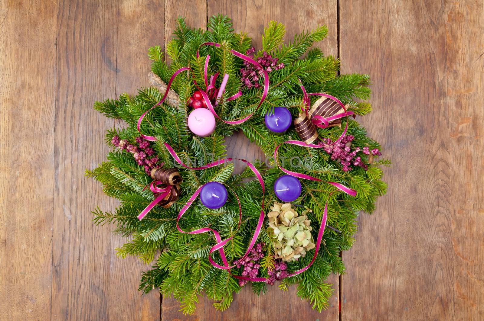 Christmas wreath advent wreath on wooden background with copy space