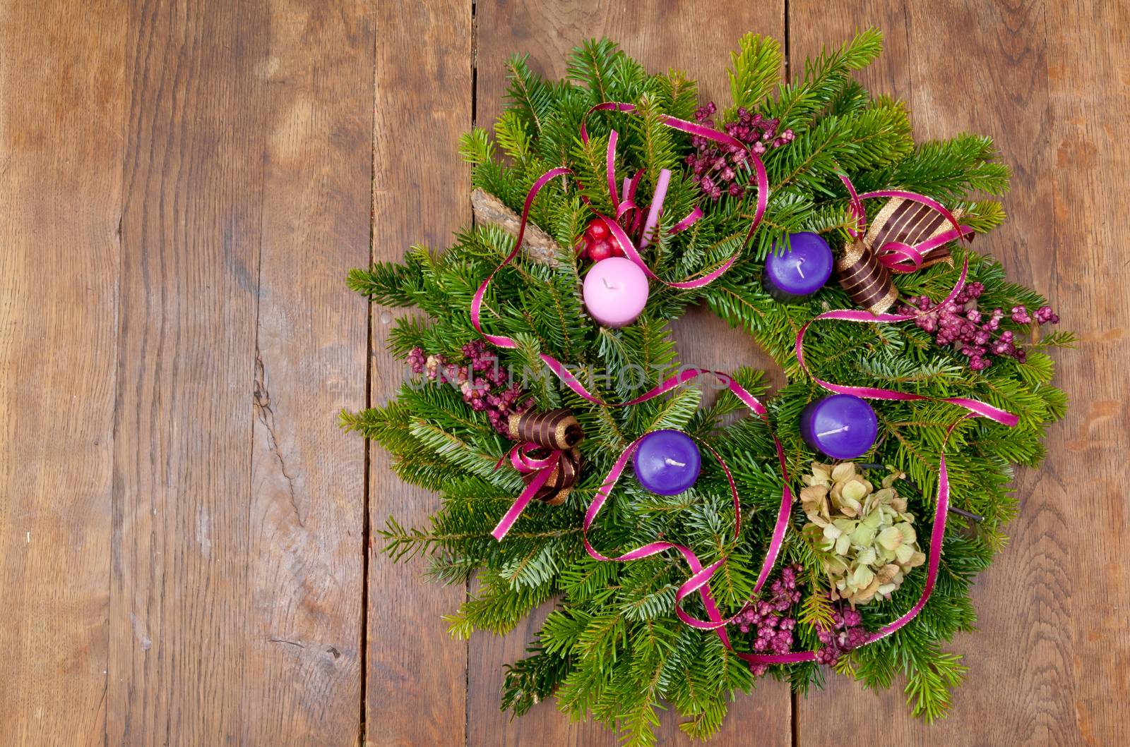 Christmas wreath advent wreath on wooden background with copy space