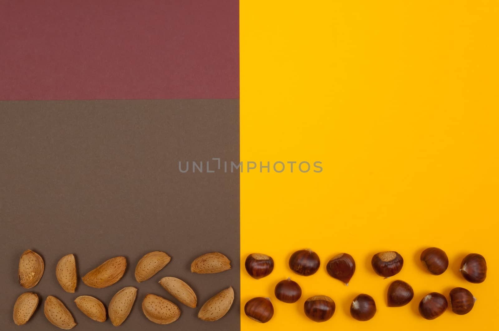 Hard shell nuts on split background by horizonphoto