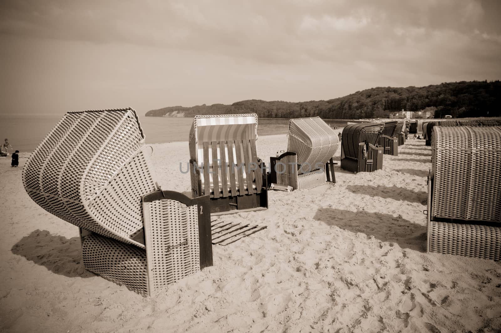 Strandkorb, Strandkoerbe in Rugen, Germany, Beach chairs on the sandy beach in Binz