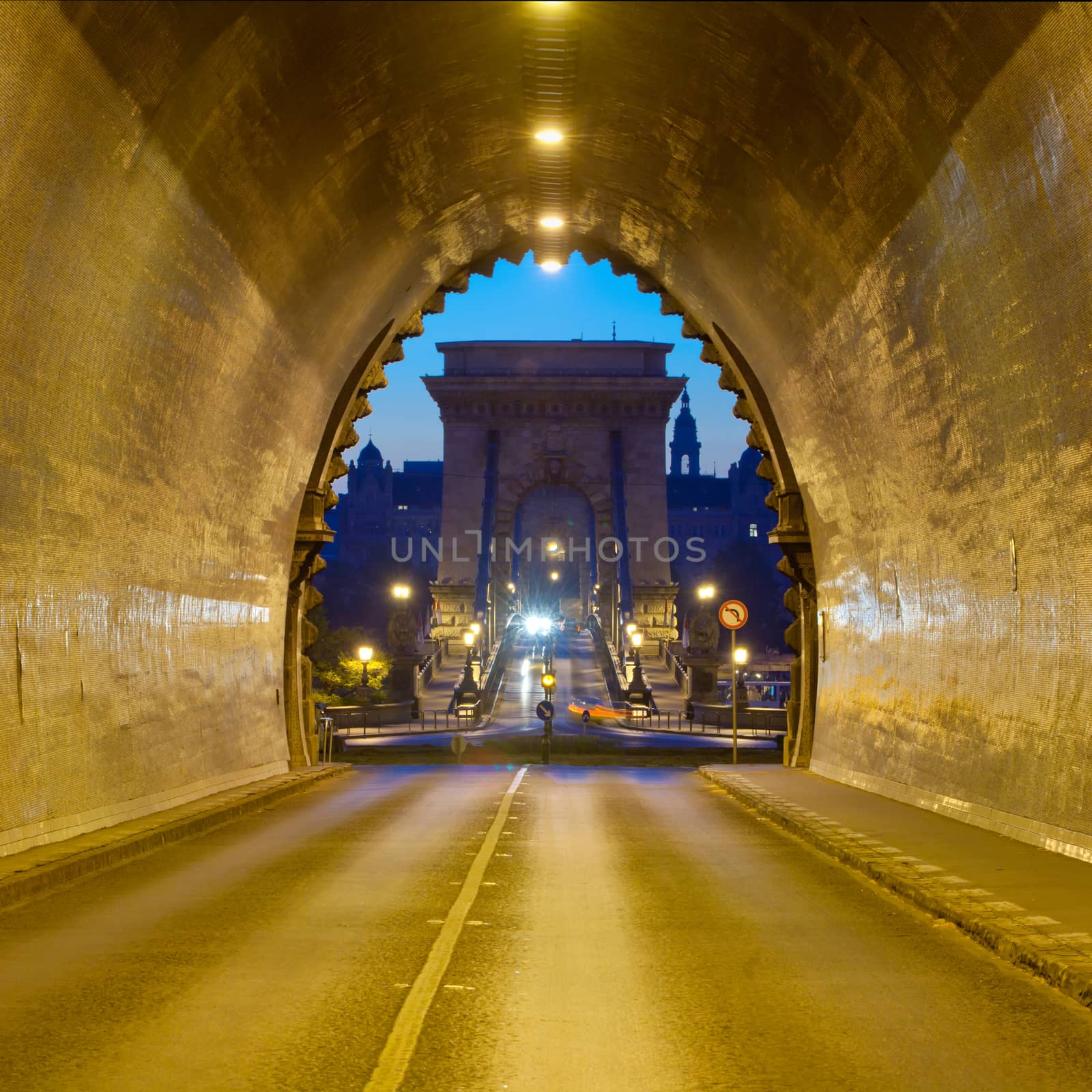 Early morning shot in Buda Castle Tunnel in direction of Chain Bridge and the Pest side of Budapest, HUngary