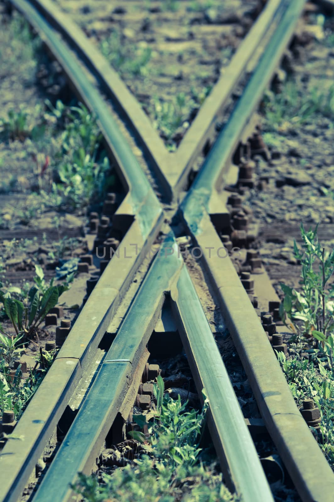 Old railway tracks forming the letter x