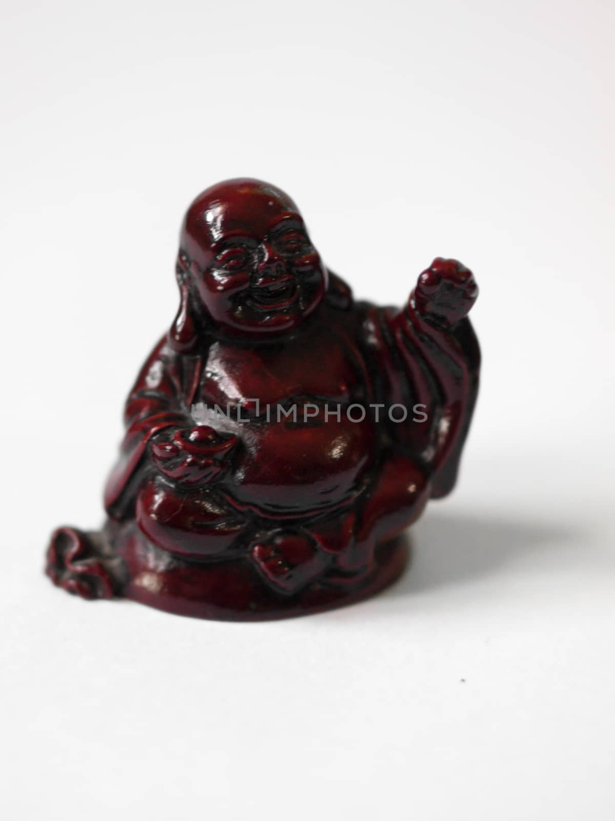 LAUGHING BUDDHA STATUE WITH WHITE BACKGROUND