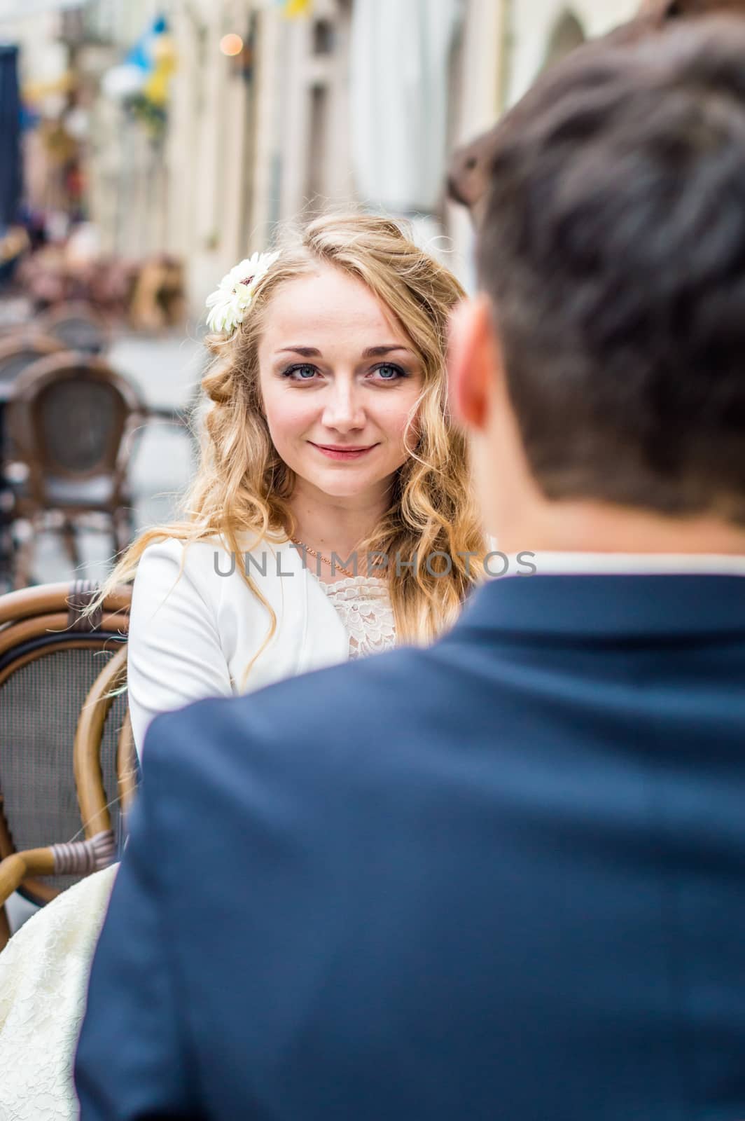 newlyweds sitting in the Cafe by okskukuruza