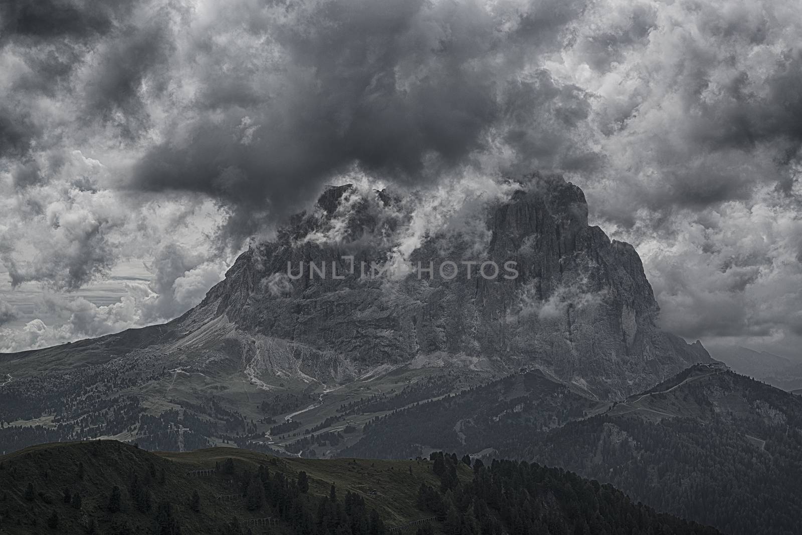 The Top of Langkofel in the clouds seen from Dantercepies, summer afternoon - Val Gardena, Dolomites