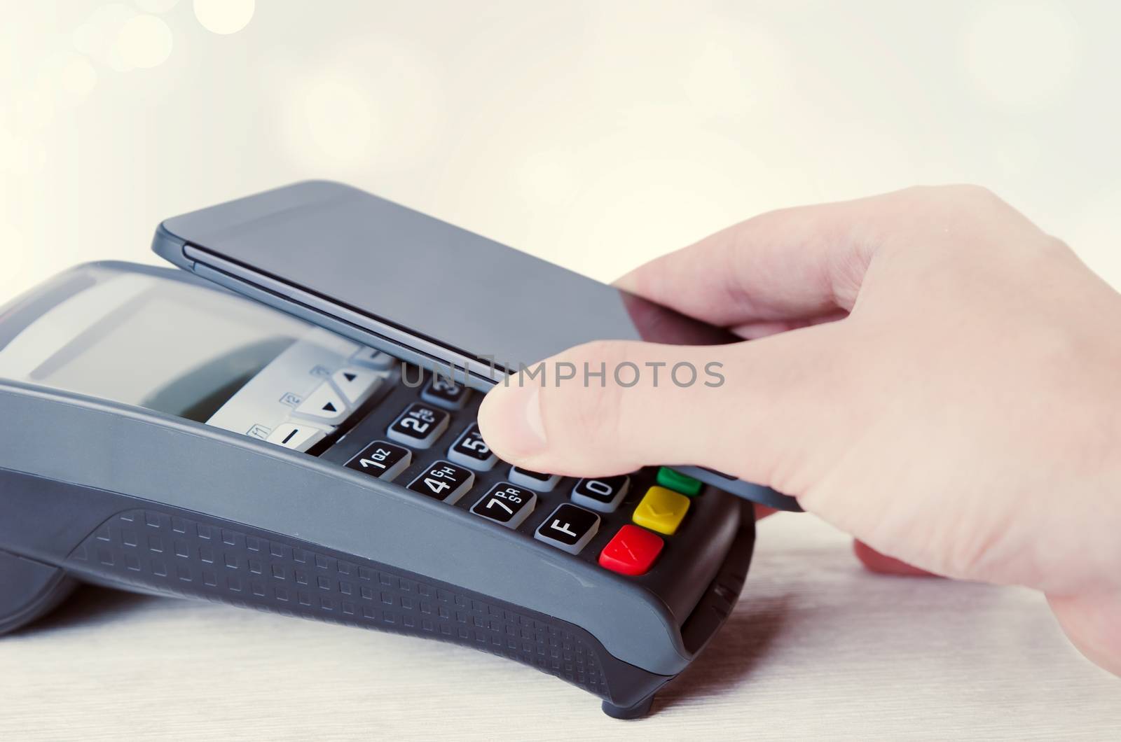 Mobile payment with smart phone. payment nfc near field communication phone credit card concept