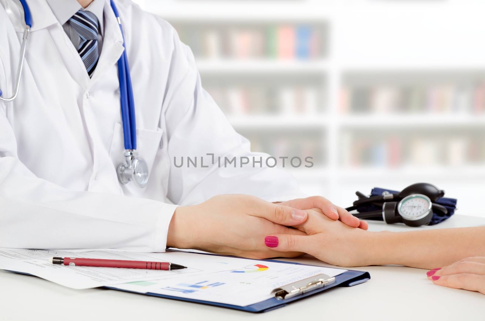 Doctor and patient medical consultation. doctor patient health care office desk stethoscope medical concept