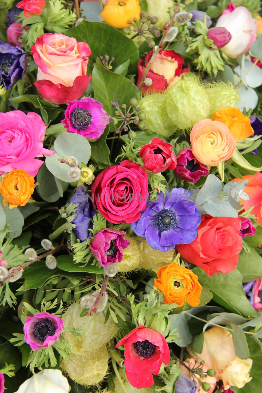 Wildflower arrangement in bright colors by studioportosabbia