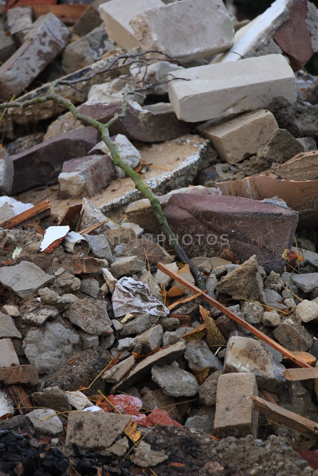 Bricks in a dumpster near a construction site, home renovation