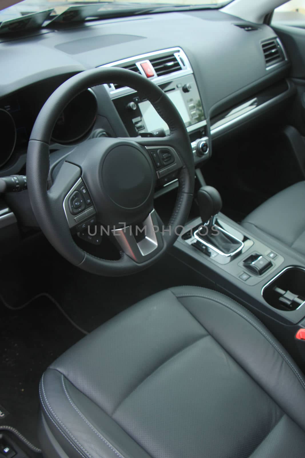 Interior of a modern luxury brand car, black leather and metal