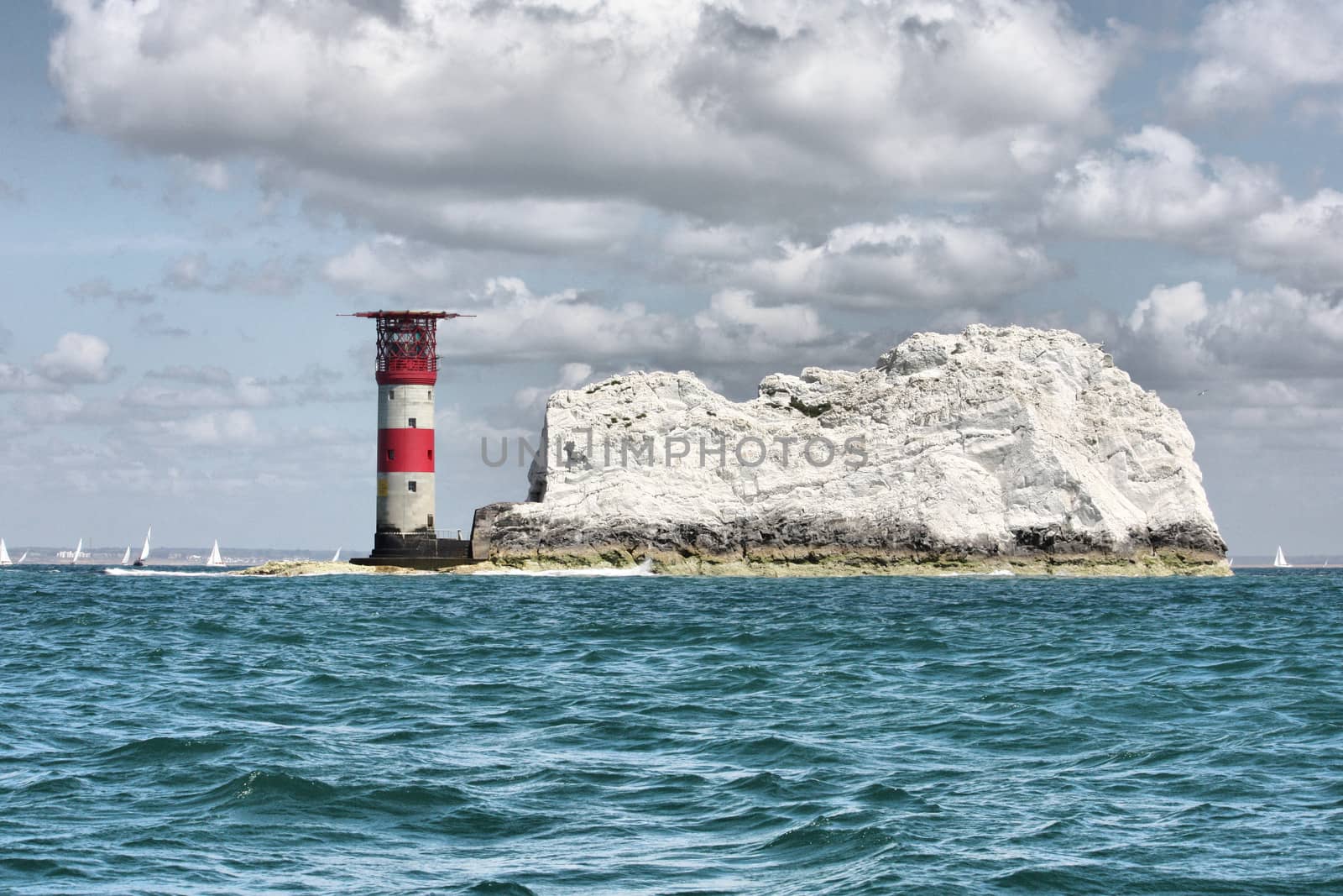 Red and white striped lighthouse at the needles by chrisga