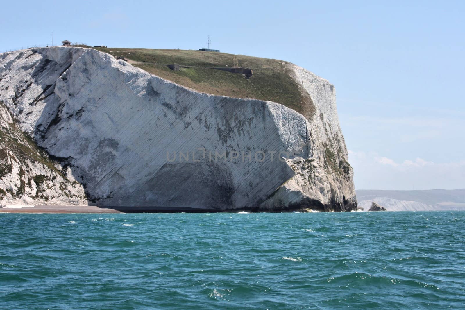 Chalk cliff on the coast above the ocean by chrisga