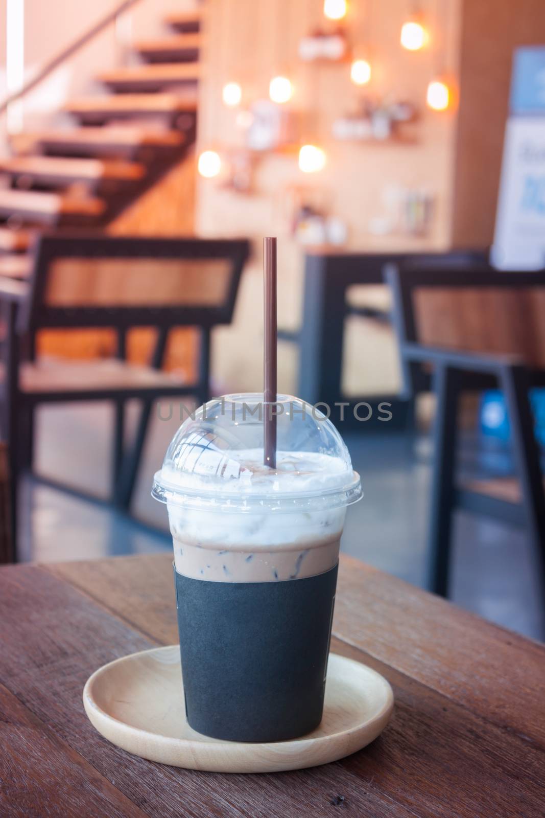 Iced coffee in coffee shop by punsayaporn