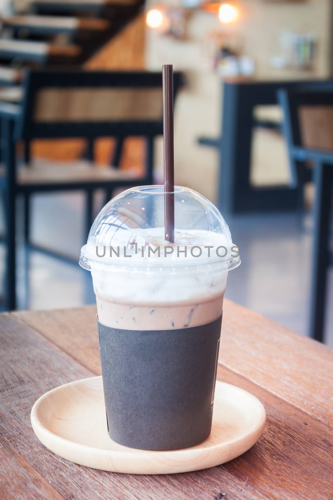 Iced coffee in coffee shop by punsayaporn