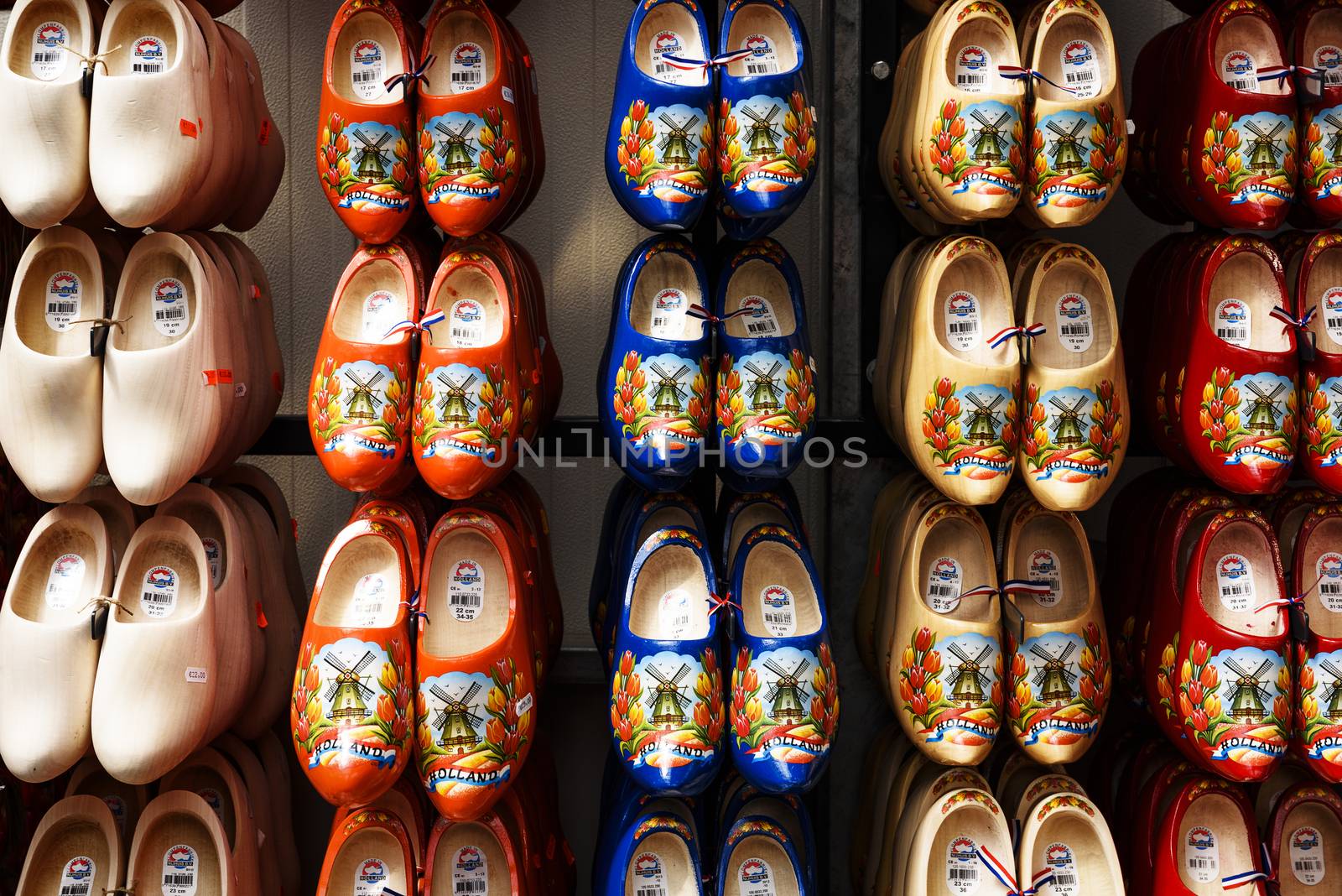 Zaanse schans, Netherlands - July 6, 2016: Many dutch traditional wooden shoes or clogs for sale in shop