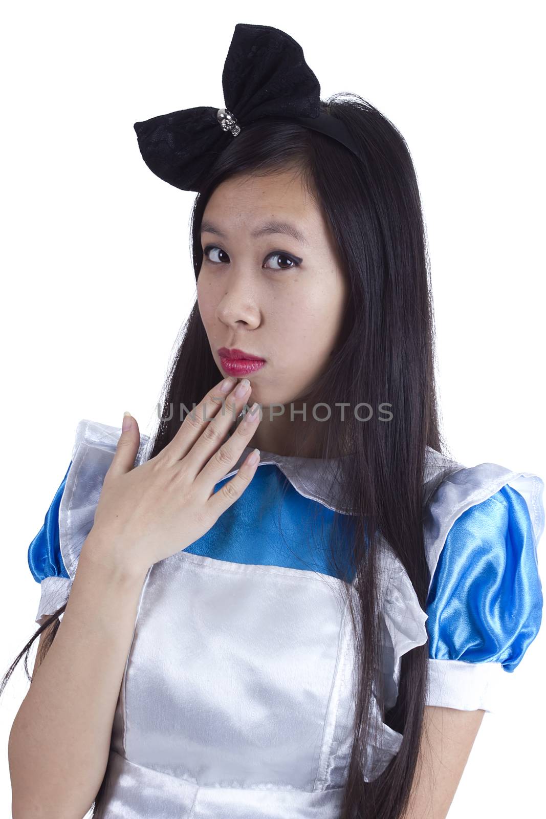 Young girl in the image of Alice on a white background