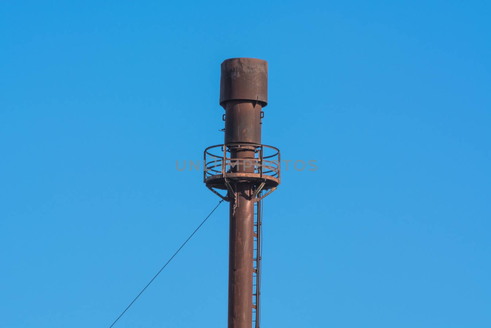 Chimney for controlled burning off of excess gas.