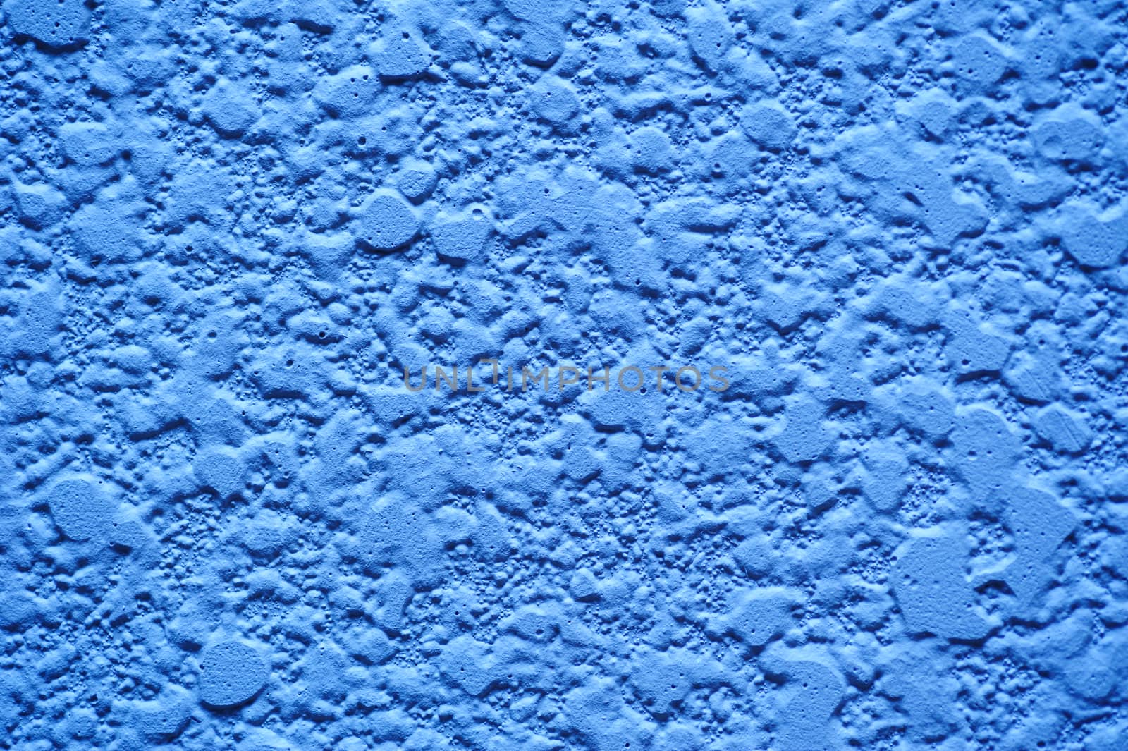 Blue texture of plaster on wall for background