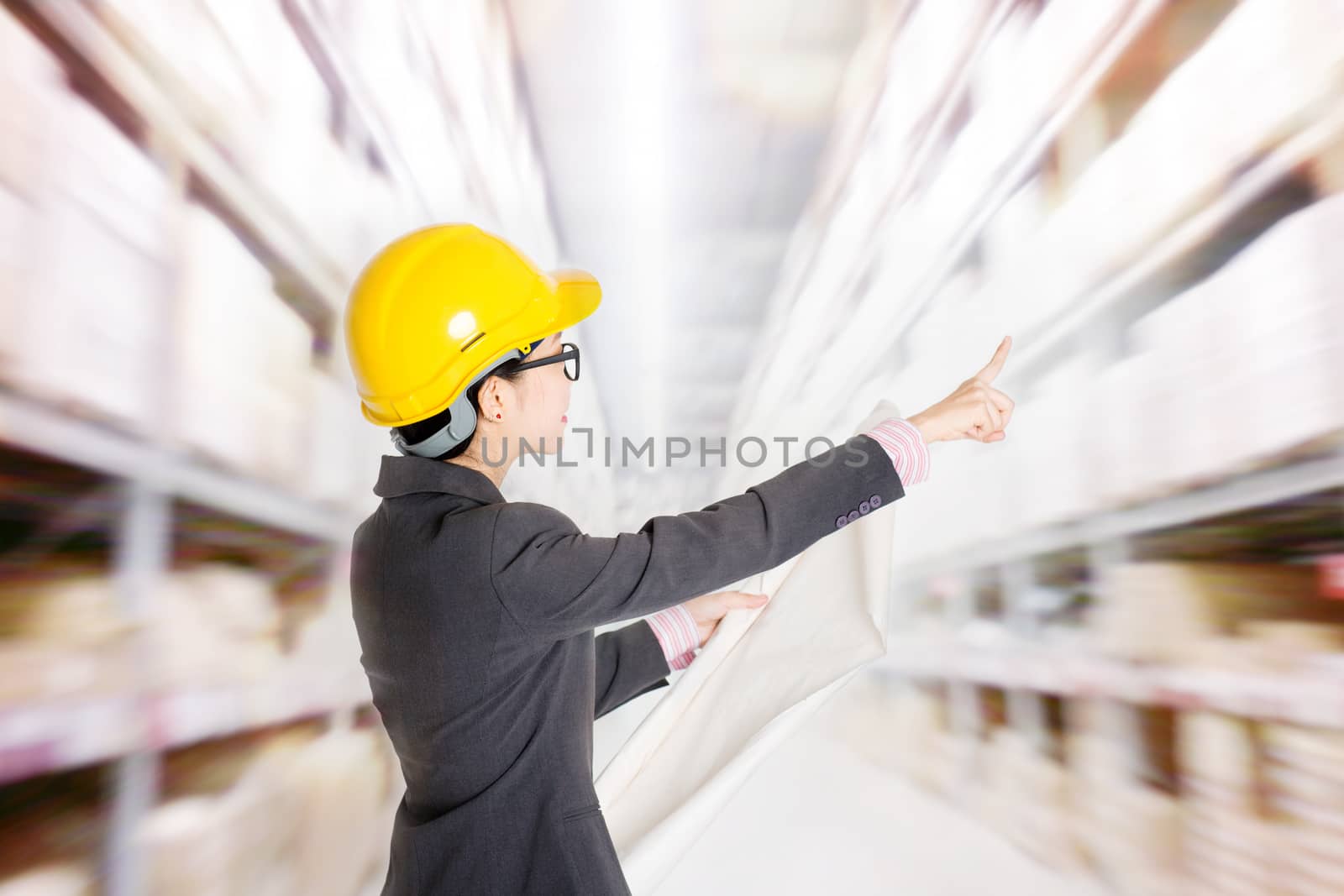 Store manager counting stock in warehouse by szefei