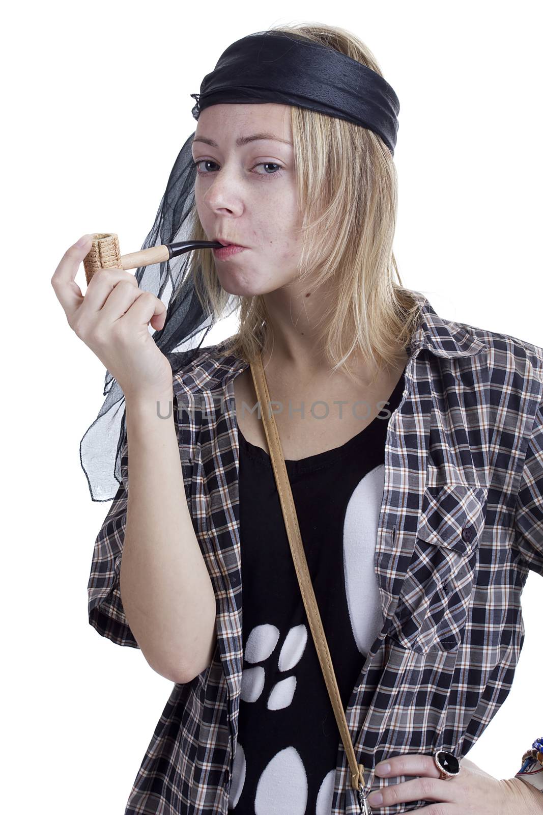 Young woman in the image of a pirate on a white background