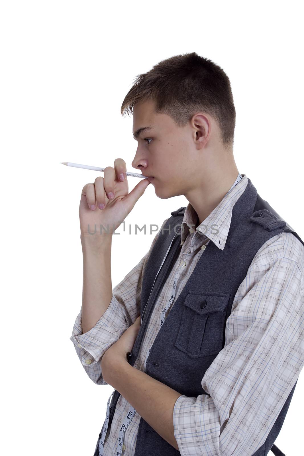 Young man tailor at work on white background