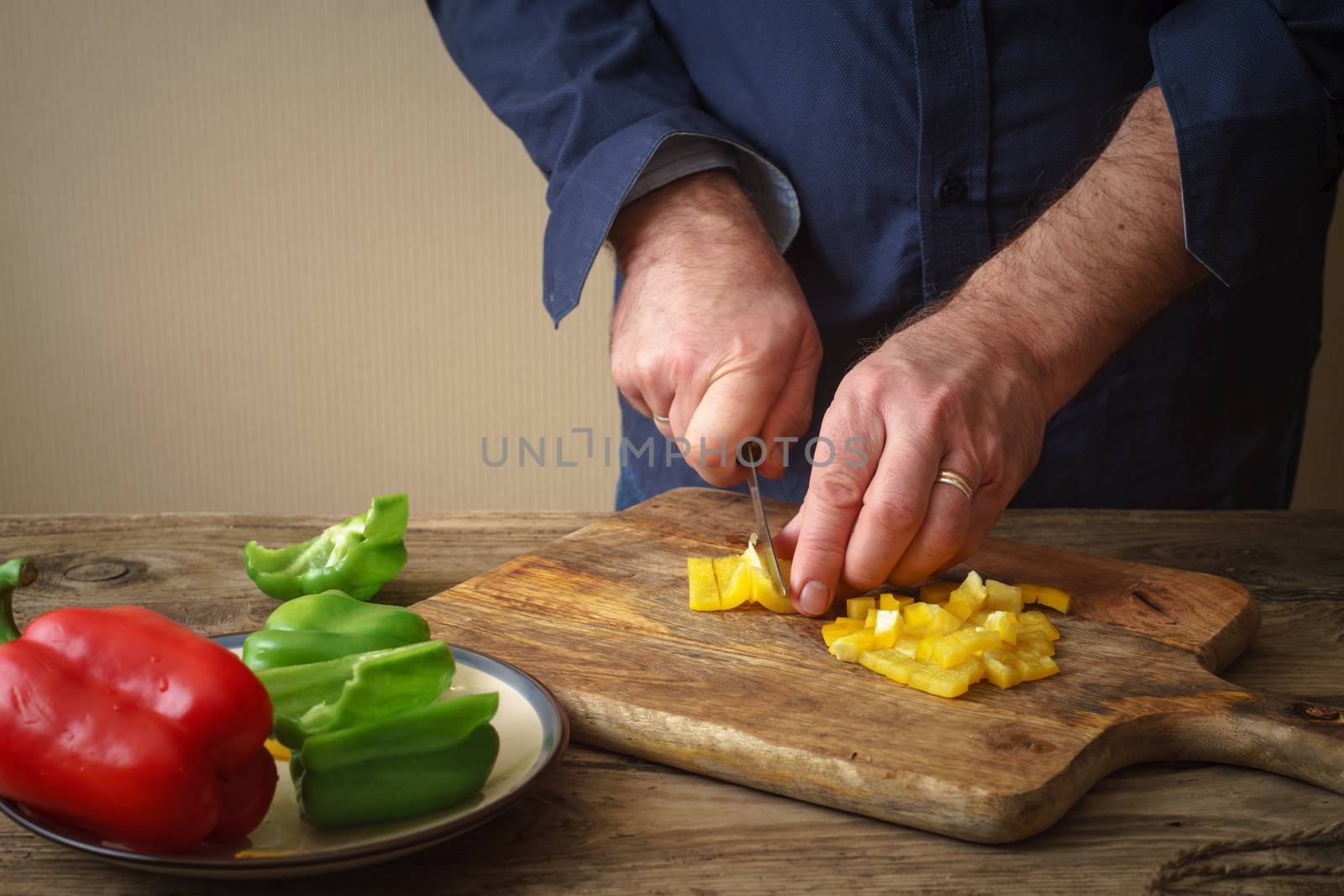 Sliced pepper pizza on a cutting board by Deniskarpenkov