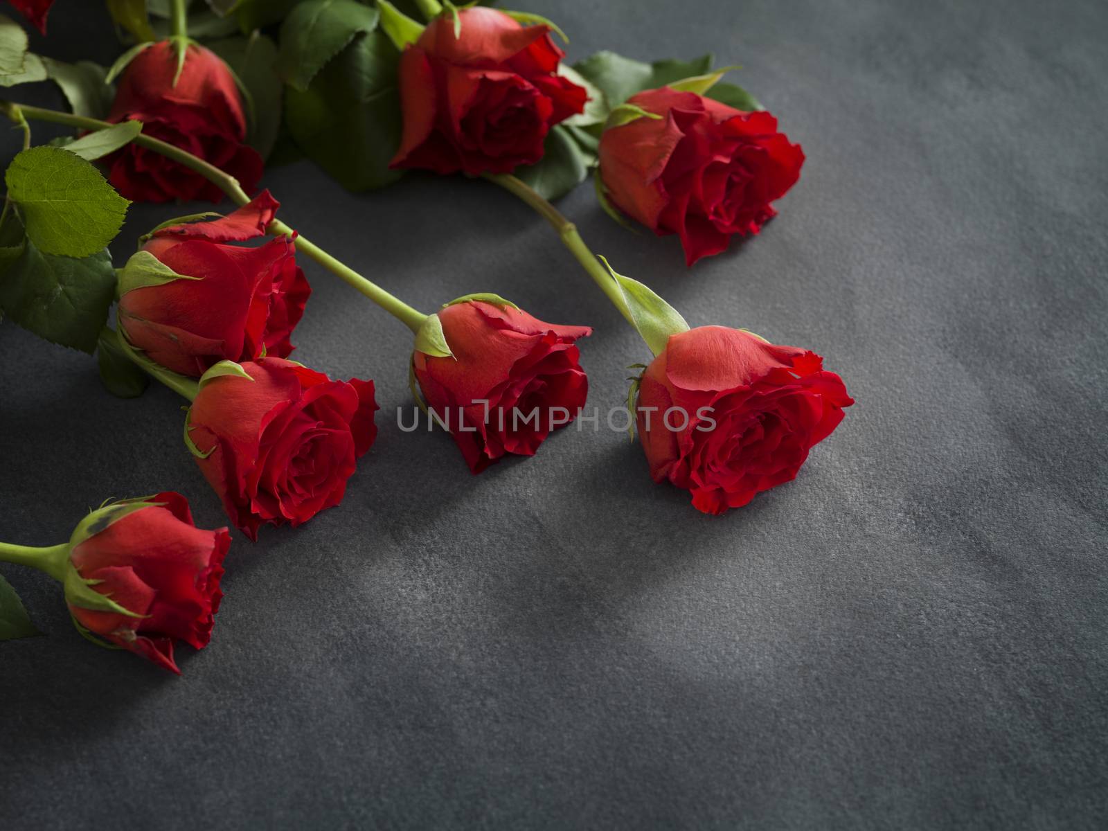 condolence card with Red Roses on grey marble background