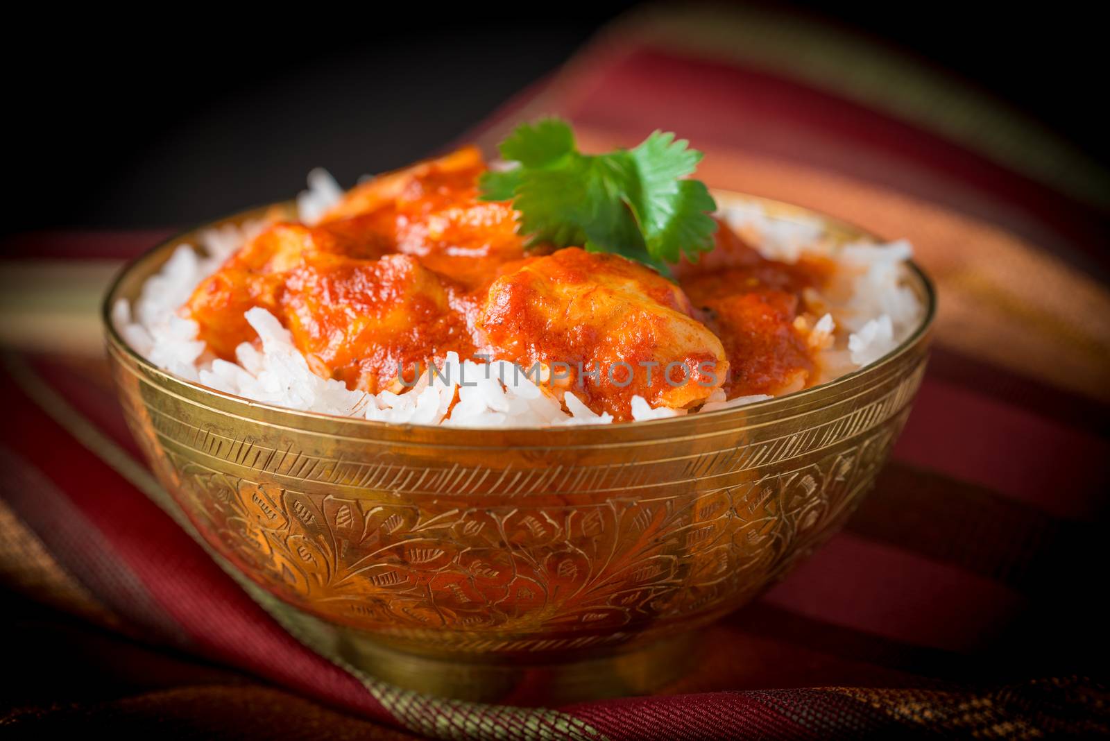 Delicious Indian butter chicken served with basmati rice.