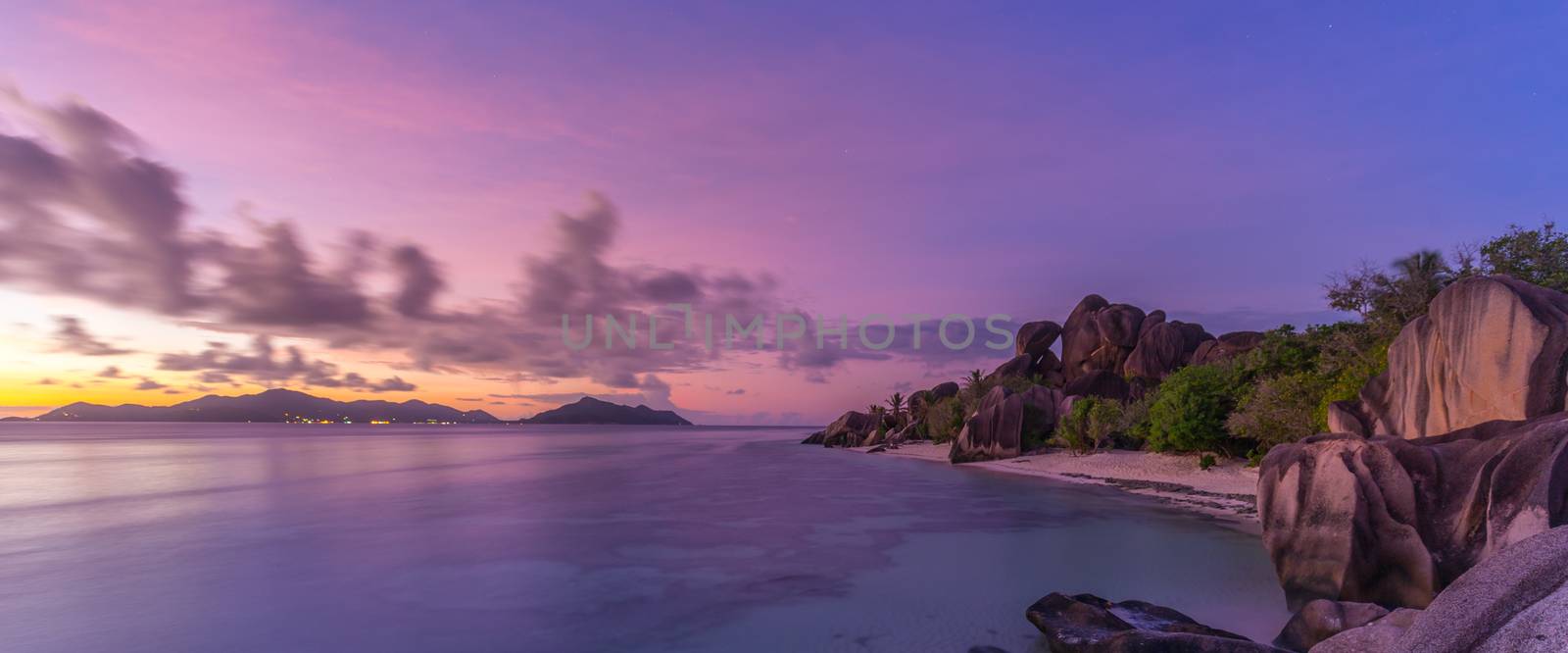 Dramatic sunset at Anse Source d'Argent beach, La Digue island, Seychelles by kasto