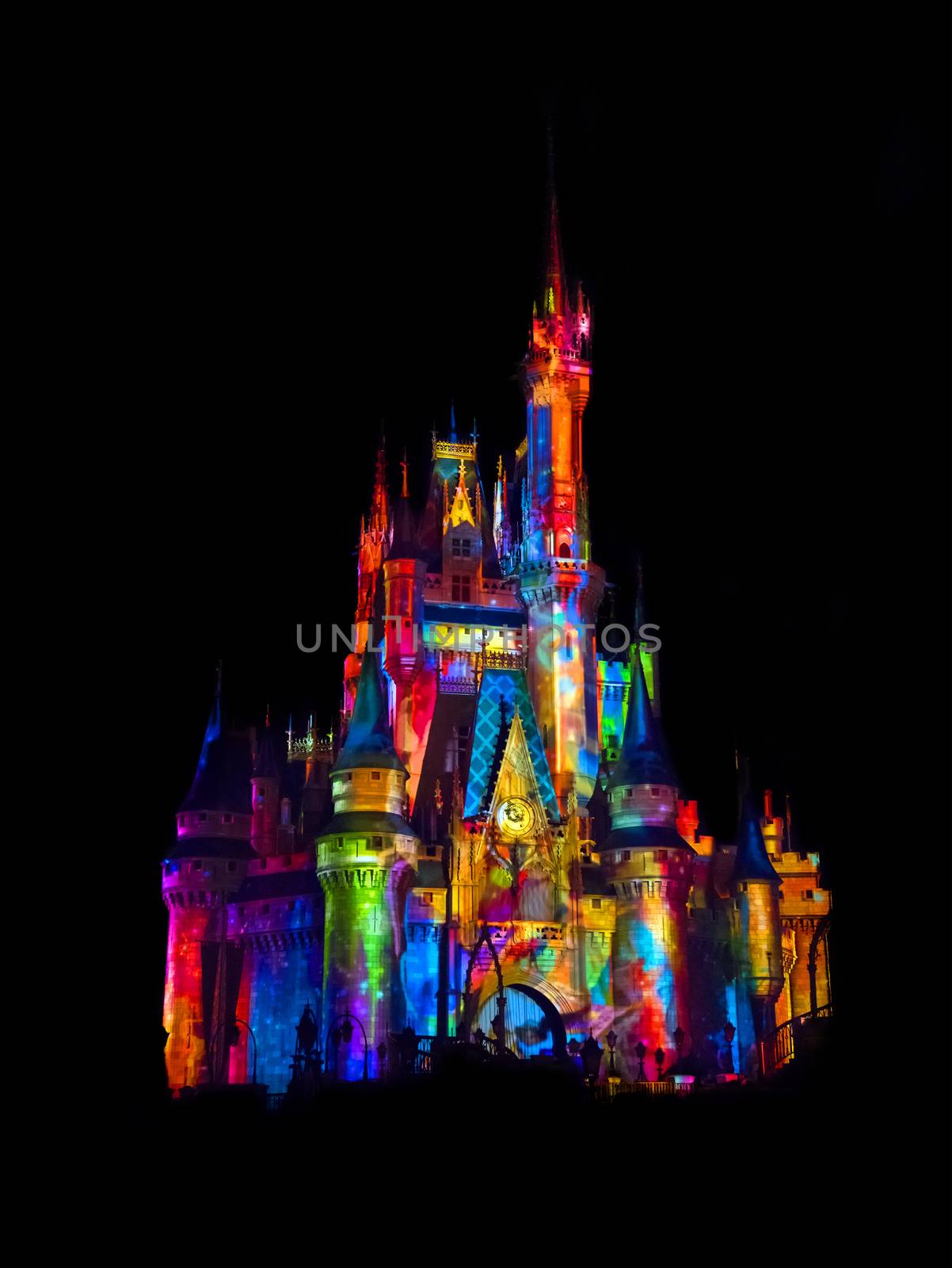 Disney castle beautifully lit with colors