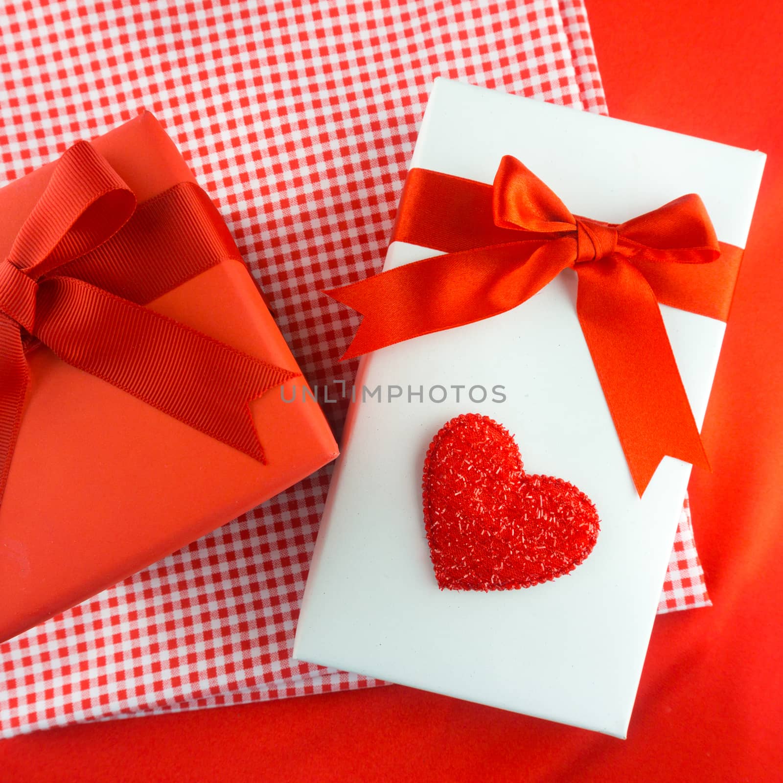 Valentines gift box with a red bow on red background Image of Va by nopparats