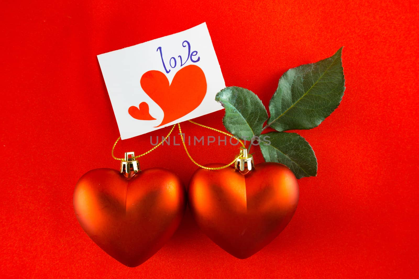 Red heart Valentines with message card on red background. Image of Valentines day.