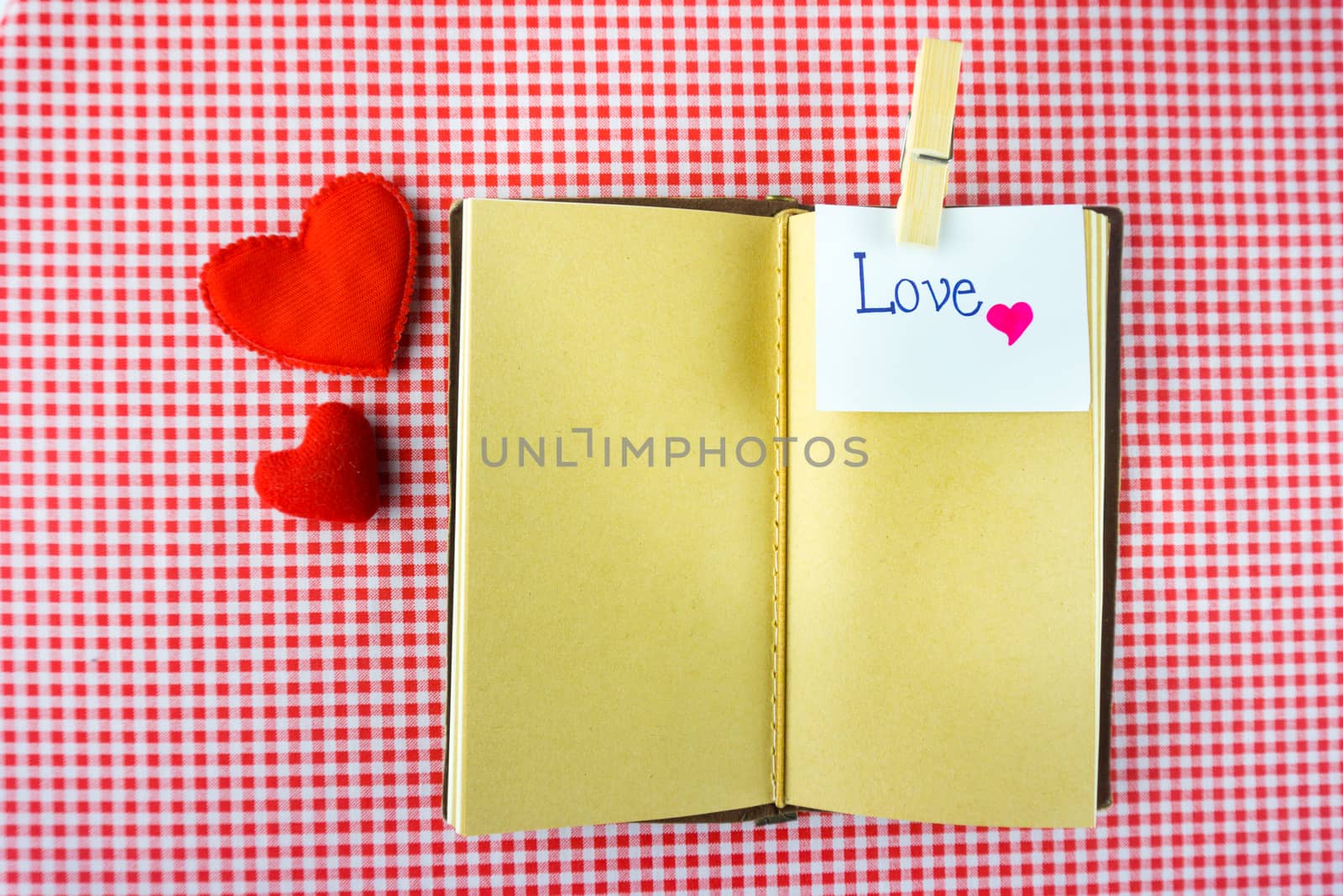 Valentines notebook with message card on red background Image of by nopparats