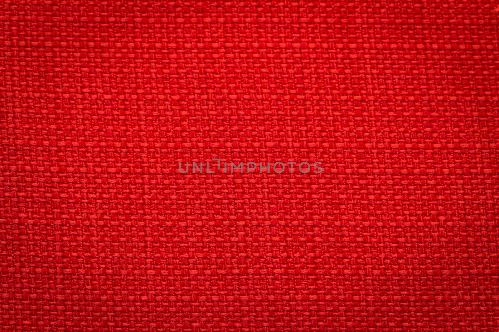 Rustic canvas fabric texture in red color. Square shape