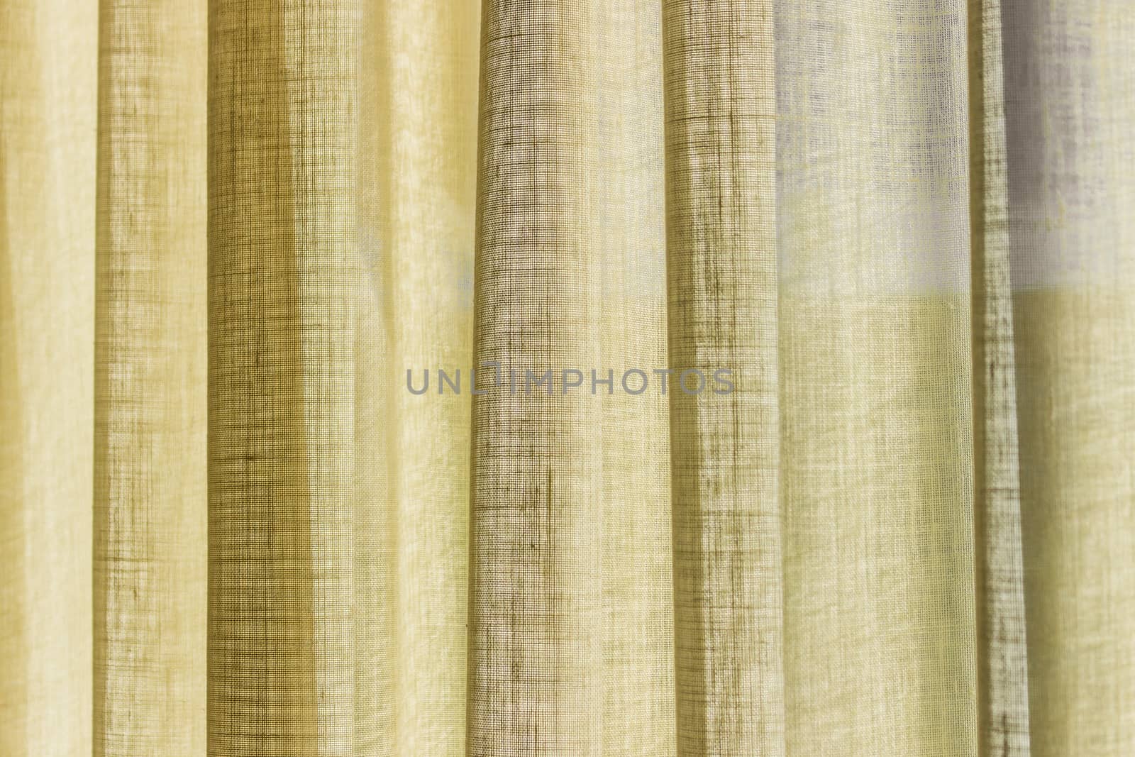 detail of the yellow curtain with folds